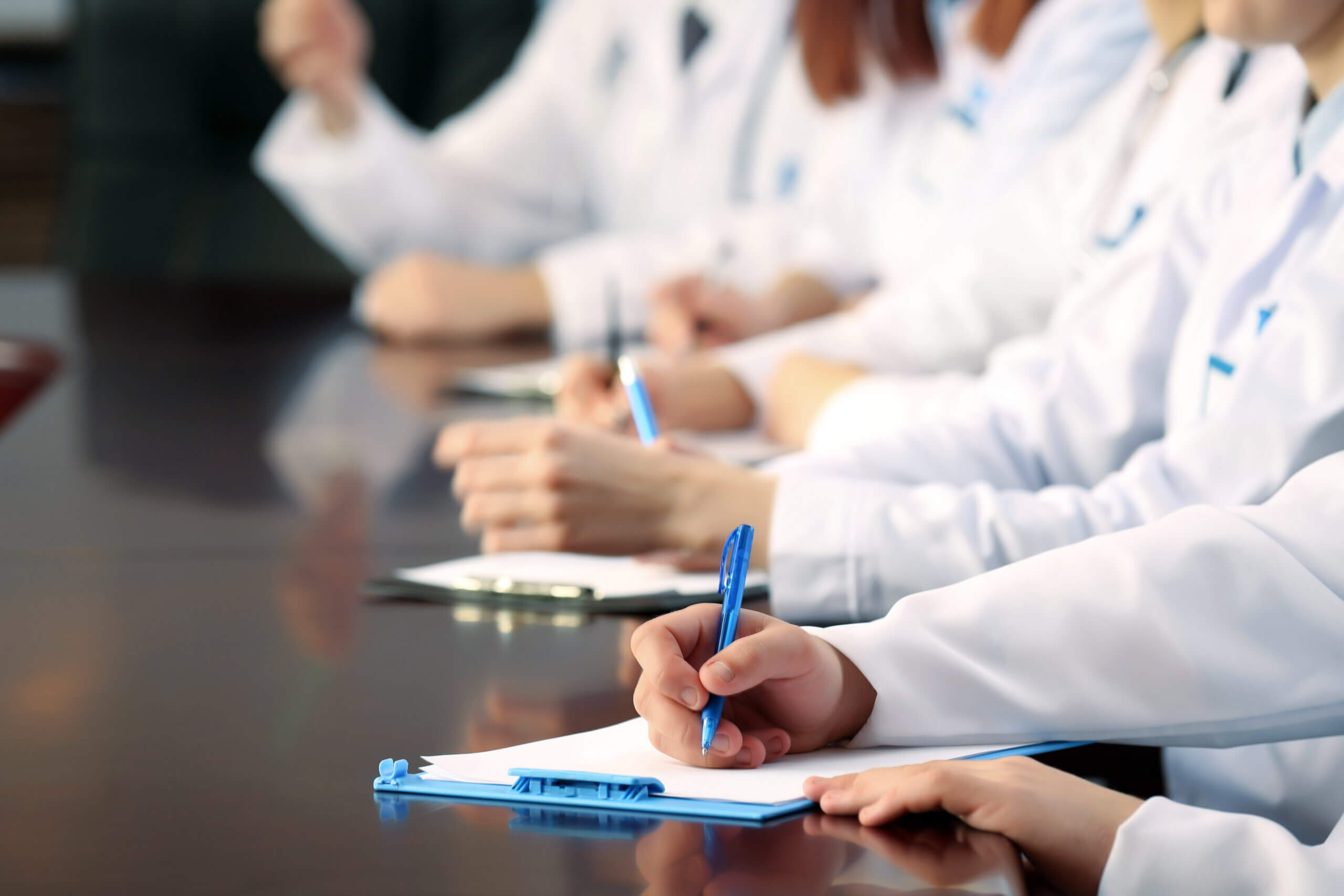 Medical Workers Working In Conference Room