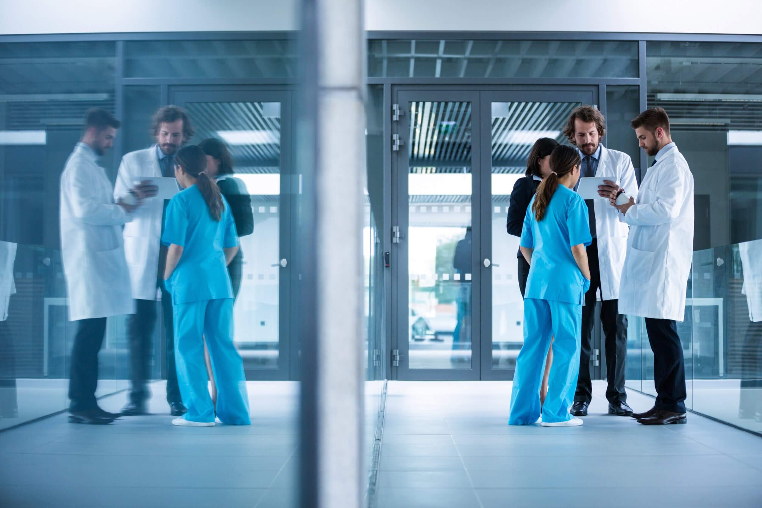 Businesswoman Interacting With Doctors